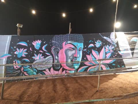 Buddha and lotus night wall, Vagator, Goa