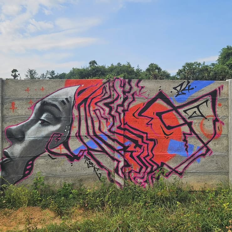 Face and letters, Cosmorama, Auroville
