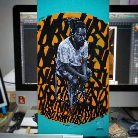 Seated man over calligraphy, board